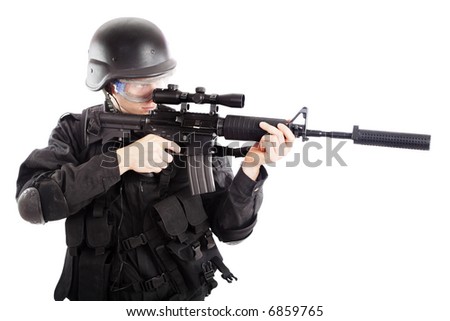 holding gun. of a soldier holding gun.