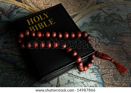 The holy bible with beads