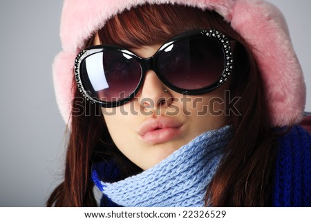 Portrait of a styled professional model. Theme: winter, fashion