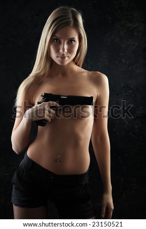 Une vraie ou fausse ? - Page 2 Stock-photo-shot-of-a-beautiful-girl-holding-gun-23150521