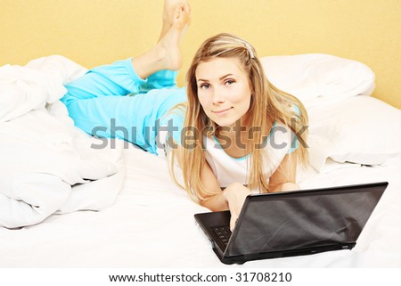 Young woman having a rest with her laptop.