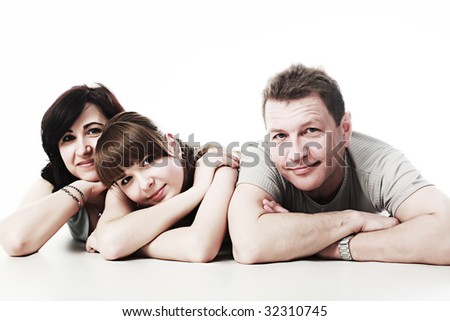 stock photo : Happy family: parents with their grown-up daughter.