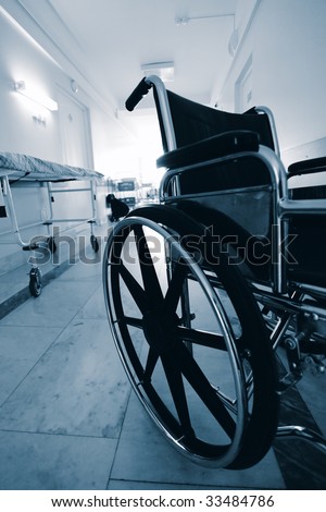 Medical theme: a wheel chair in a hospital.
