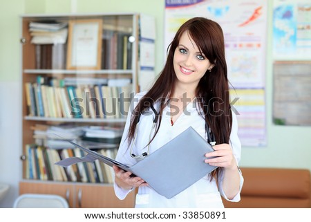 Medical theme: doctor is studying a medical report.