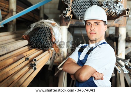 Industrial theme: a worker at a manufacturing area.
