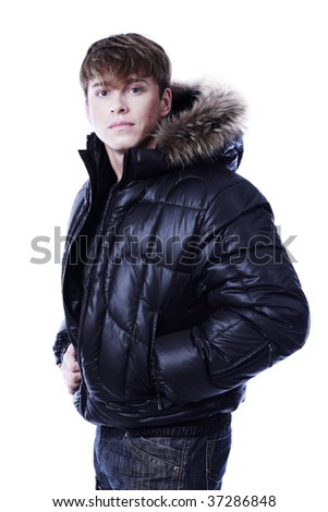 Portrait of a professional male model in winter clothes.