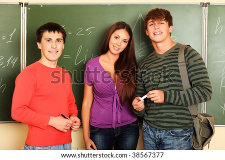 Educational theme: students in a classroom.