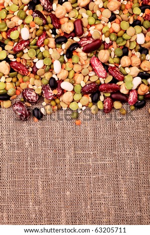 Food theme: kidney bean, lentil, peas and chick-pea background.