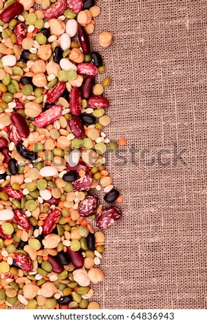 Food theme: kidney bean, lentil, peas and chick-pea background.