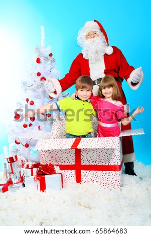 Christmas theme: Santa Claus and children having a fun.