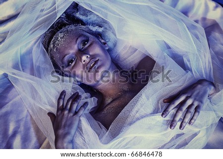 Art portrait of a beautiful woman in veil. Fashion, beauty.