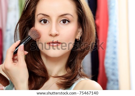 Young beautiful woman during daily morning routines