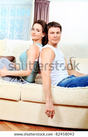Happy married couple having a rest at home.