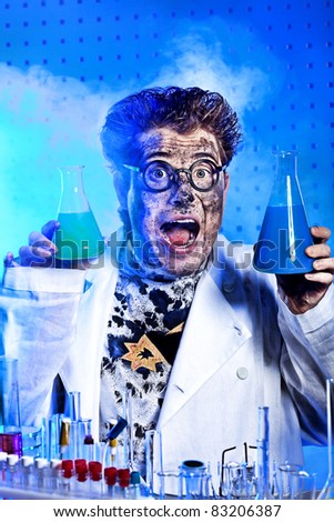 Medical theme: funny crazy scientist is working in a laboratory.