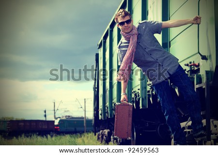 Portrait of a handsome young man posing outdoor.