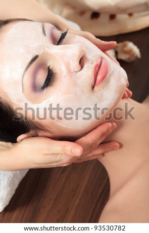 Portrait of a woman with spa mask on her face. Healthcare, medicine.