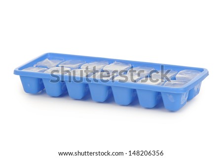 Blue ice tray with ice on white background