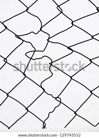 Fence Barbed Wire barbwire in which the fallen snow