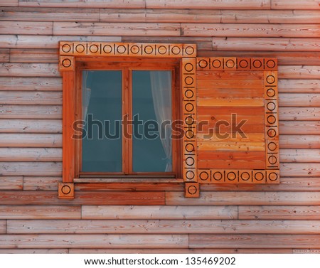 Window in an wooden peasant house, ethnic house and window,