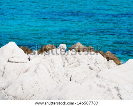 Untouched nature abstract archipelago in seashore with rocks in water on peninsula Halkidiki, Greece