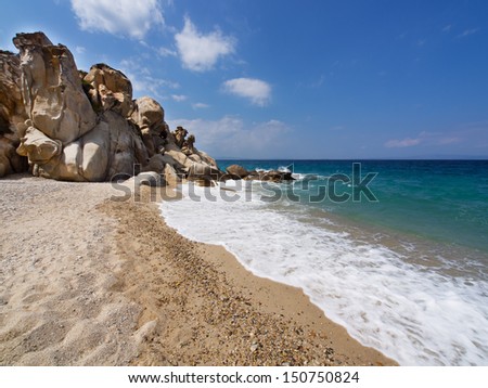 Paradise bay beach , Untouched nature abstract archipelago in seashore with rocks in water on peninsula Halkidiki, Greece