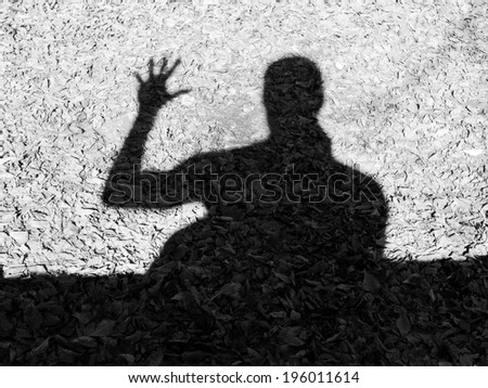 Silhouette of a man that welcomes