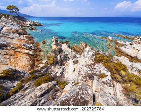 Paradise bay beach, untouched nature abstract archipelago in seashore with rocks in water on peninsula Halkidiki, Greece