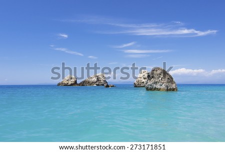 Paradise bay beach, untouched nature abstract archipelago in seashore with rocks in water on island Lefkada or Lefkas or Leukas, is a Greek island in the Ionian Sea on the west coast of Greece