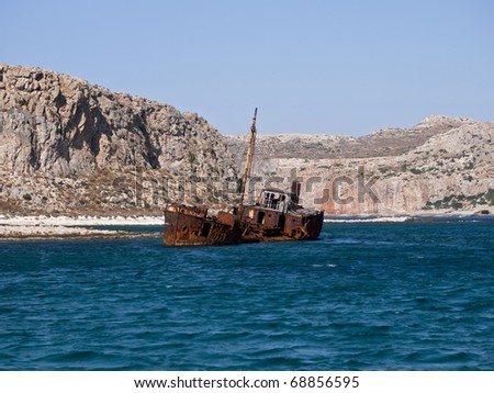 Rusty boat in sea