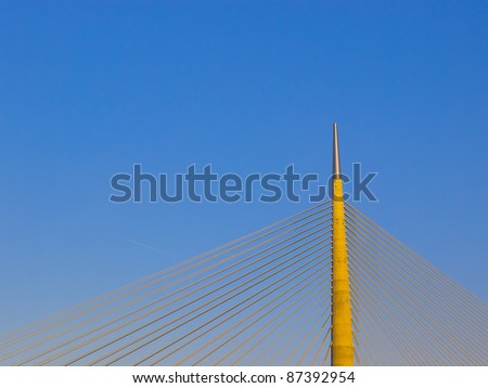 Part of construction of new Belgrade biggest bridge with one tower ( pilon) in the world end hoisting crane / river Sava, Serbia / under construction / one pylon / wide angle lens