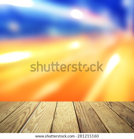 Empty wood table over blurred city light bokeh background, product display template,deck,sky,city lights