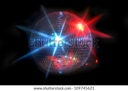 Mirror disco ball with laser lights reflecting off in blue and red on a dark background