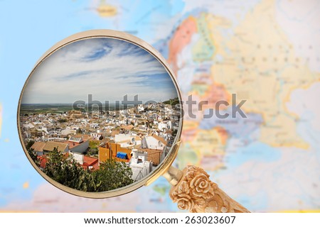 Looking in on Osuna, Spain with European map in the background