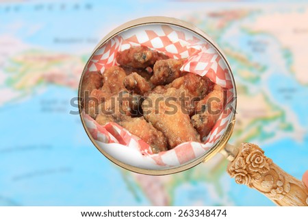 Looking in on world food showing a map of North America with chicken wings