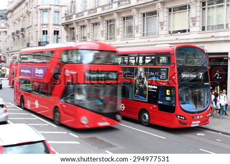 LONDON,ENGLAND,June 17, 2015: Double Decker buses speeding through the busy streets of London England on June 17, 2015