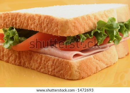 ham sandwich with tomatoes and lettuce