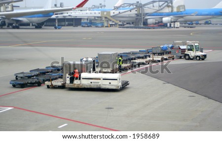 Airport workers with catering crates