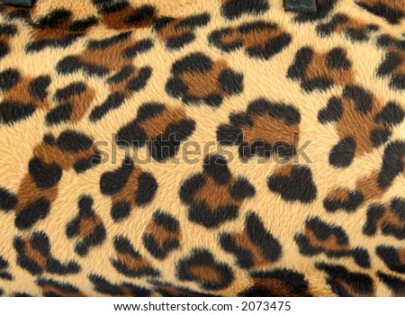 golden and black furry leopard print background