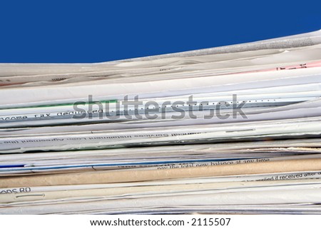 a stack of due  monthly bill payments