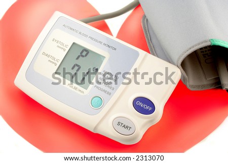 automatic blood pressure monitor showing heart beats per minute