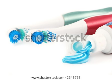 toothbrushes with toothpaste. electric toothbrushes and