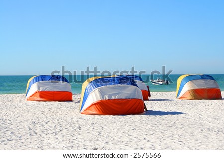 colorful shady canopies along the beach in Florida along the Gulf Coast in Clearwater Beach