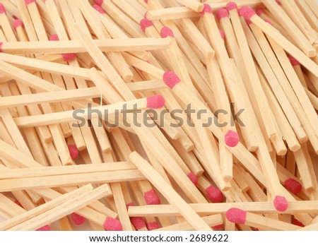 piled up unused wooden match sticks and box