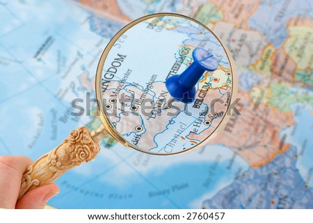 magnifying glass over London, England  map with destination tack