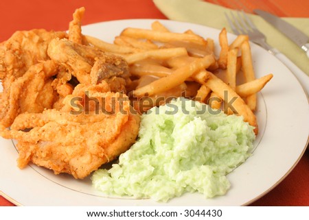 fried chicken, french fries with gravy and coleslaw dinner