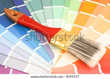rainbow paint swatches, and small paint roller for home decorating