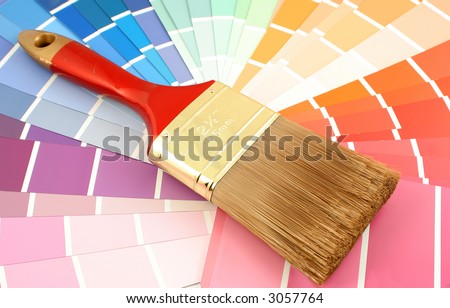 rainbow paint swatches, and small paint brush for home decorating