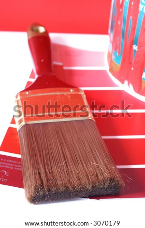paint swatches, and  paintbrush and red paint can for home decorating