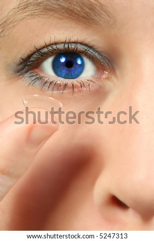 corrective contact lens and  blue eye