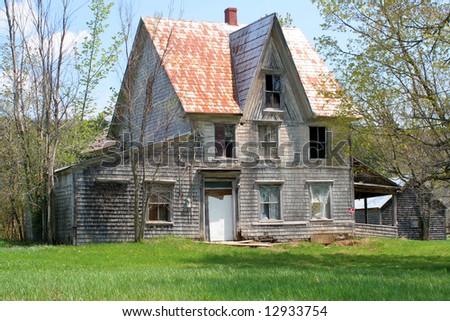 spooky, broken down, abandoned house in  a rural property